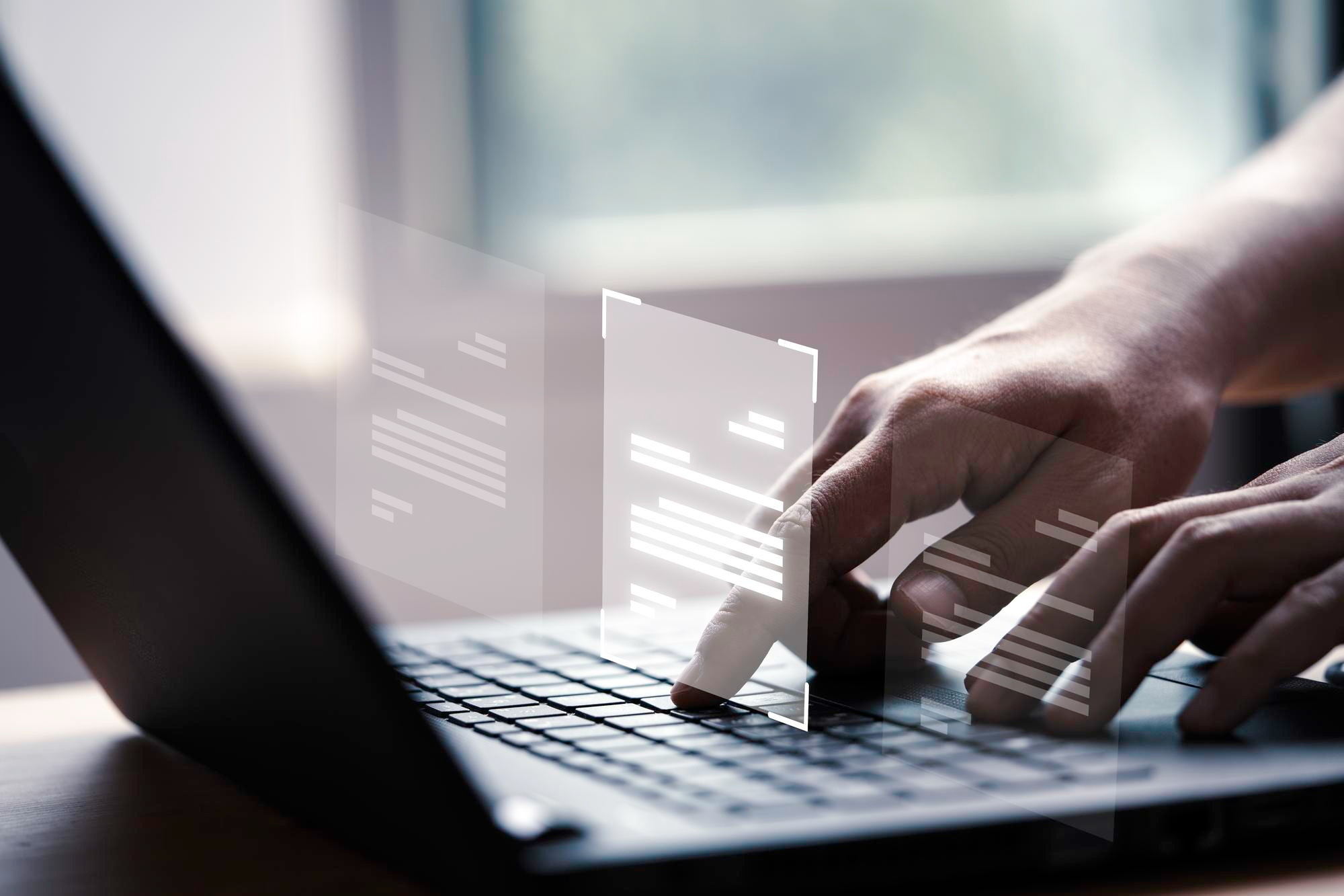 Person typing on laptop
